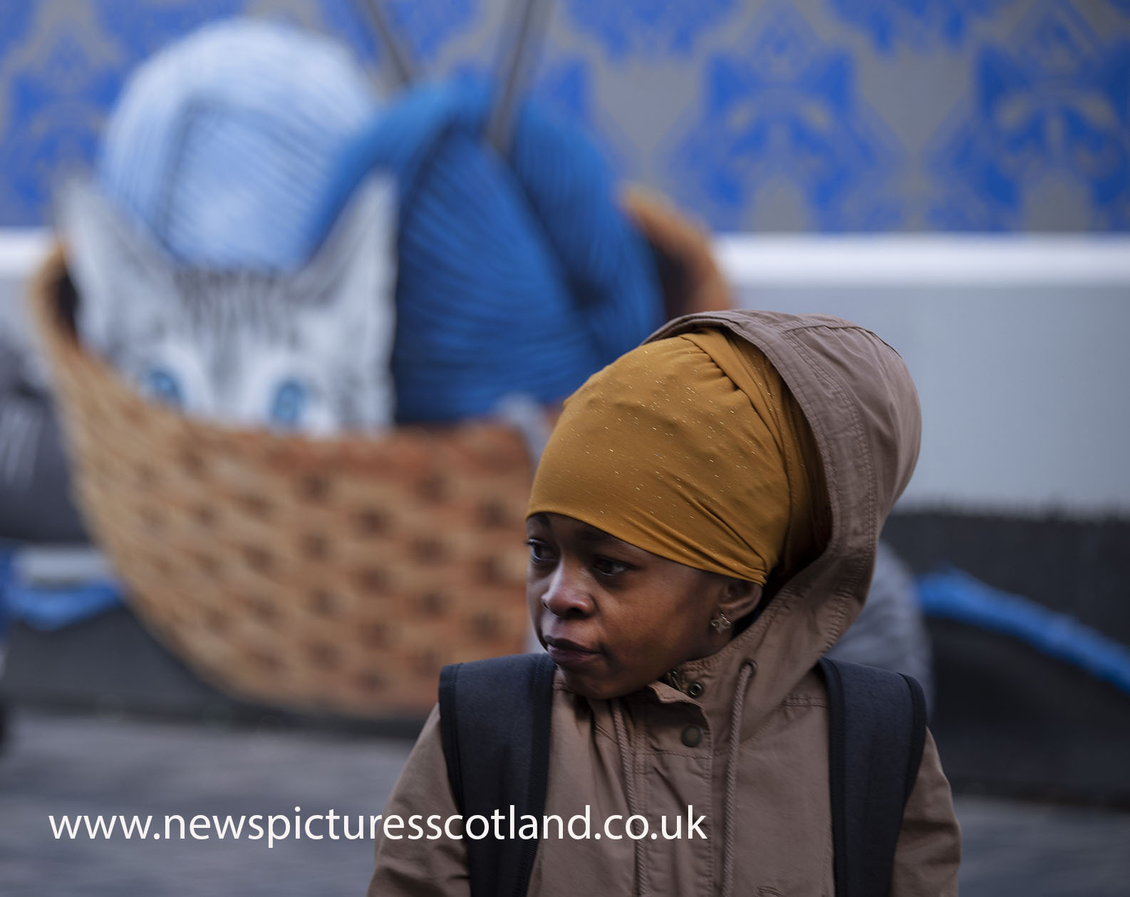 Young girl at mural , Sauchiehall Street , Glasgow, picture by David Rankin ,